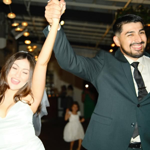 Couple getting married at Maverick Texas Brasserie
